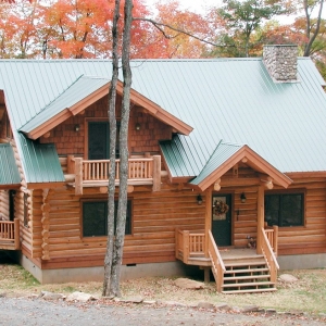 Custom Round Log home built by Mountain Construction near Jefferson, NC