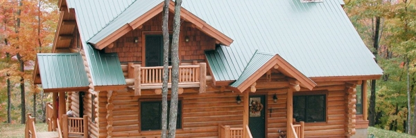 Custom Round Log home built by Mountain Construction near Jefferson, NC