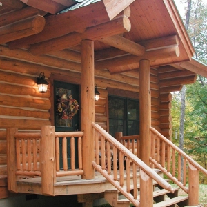 Custom Round Log home built by Mountain Construction near Jefferson, NC