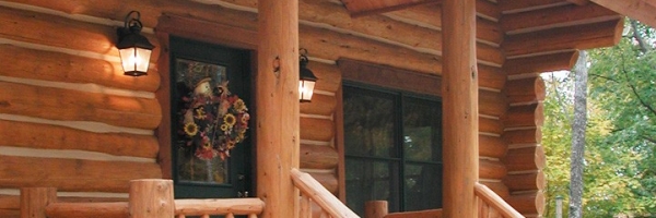 Custom Round Log home built by Mountain Construction near Jefferson, NC