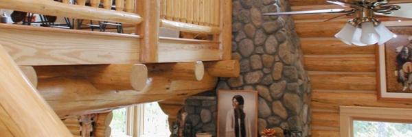 Custom Round Log home built by Mountain Construction near Jefferson, NC