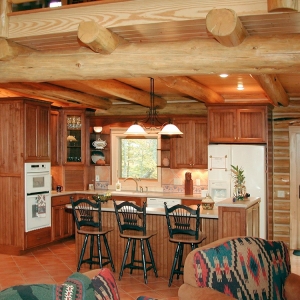 Custom Round Log home built by Mountain Construction near Jefferson, NC