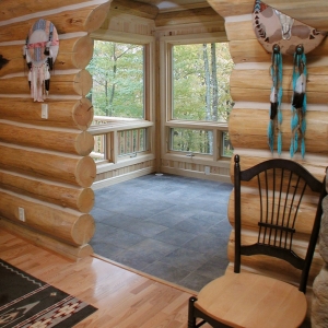 Custom Round Log home built by Mountain Construction near Jefferson, NC