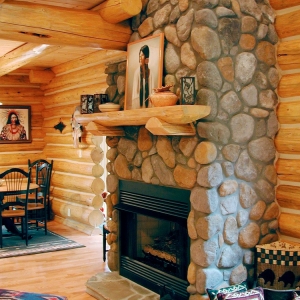 Custom Round Log home built by Mountain Construction near Jefferson, NC