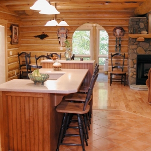 Custom Round Log home built by Mountain Construction near Jefferson, NC