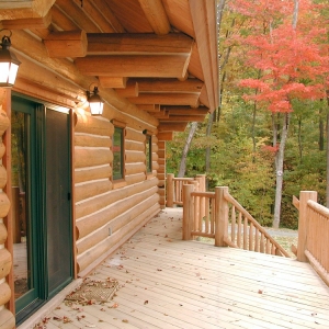 Custom Round Log home built by Mountain Construction near Jefferson, NC