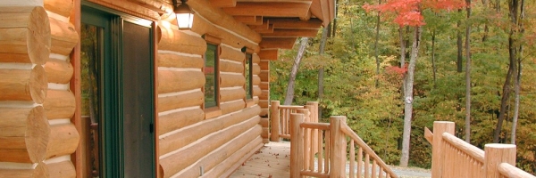 Custom Round Log home built by Mountain Construction near Jefferson, NC