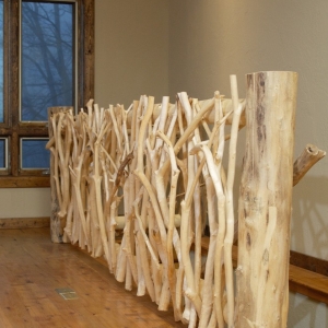 hand-crafted twig railing adds rustic flair