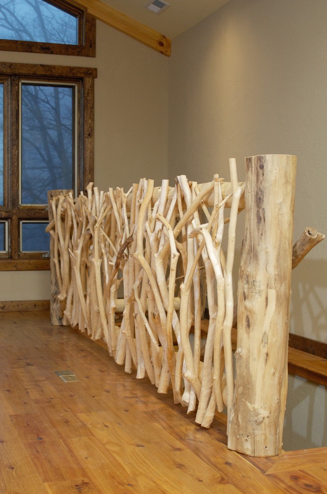 hand-crafted twig railing adds rustic flair
