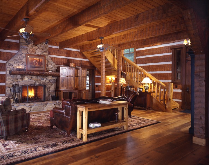 Great room log section with stone fireplace