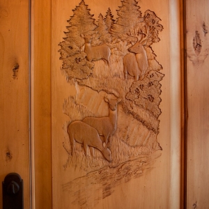hand carved entry door in tennessee home built by Mountain Construction