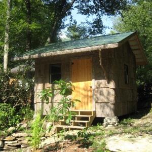 Custom log home in NC mountains designed to blend into the woods