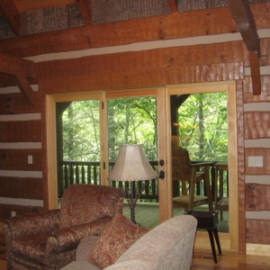 Custom log home in NC mountains designed to blend into the woods