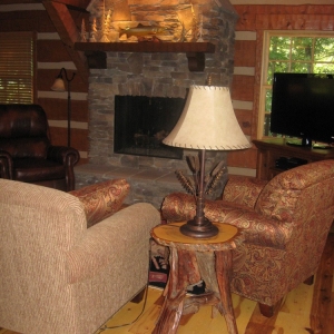 Custom log home in NC mountains designed to blend into the woods