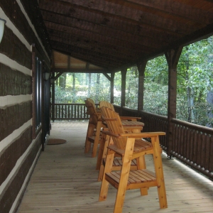 Custom log home in NC mountains designed to blend into the woods