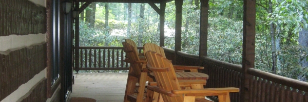 Custom log home in NC mountains designed to blend into the woods