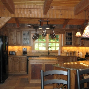 Custom log home in NC mountains designed to blend into the woods