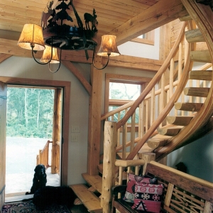 handcrafted half round log staircase