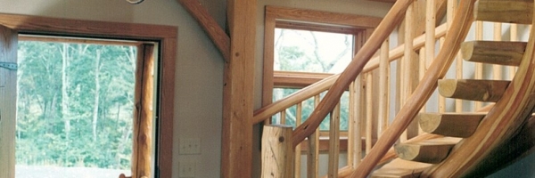 handcrafted half round log staircase