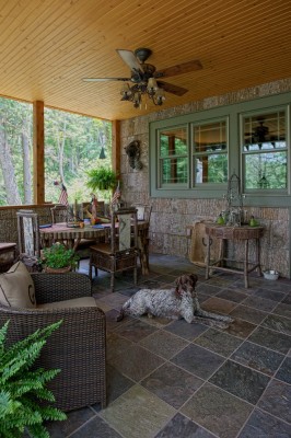 Poplar bark siding, twig railing and stone fireplace