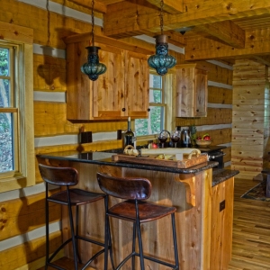 Mountain Construction builds a Hearthstone Timberwright Log Home adjoining the Pisgah Forest