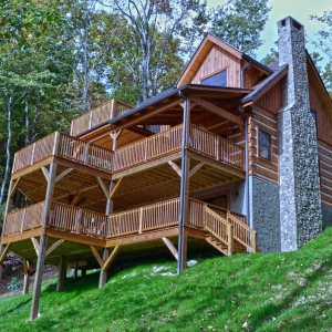 Mountain Construction builds a Hearthstone Timberwright Log Home adjoining the Pisgah Forest