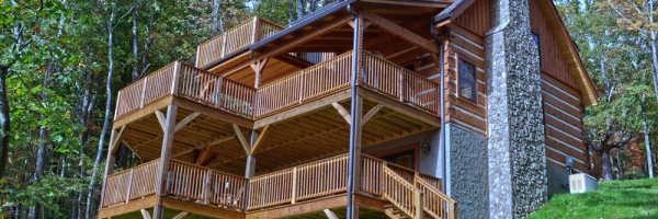 Mountain Construction builds a Hearthstone Timberwright Log Home adjoining the Pisgah Forest