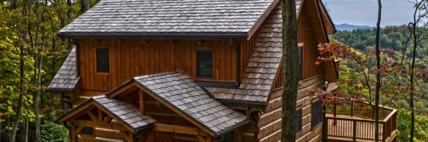 Mountain Construction builds a Hearthstone Timberwright Log Home adjoining the Pisgah Forest