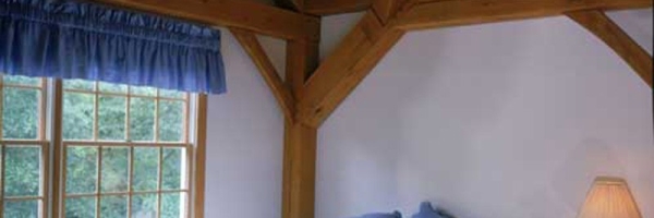 bedroom with vaulted ceiling