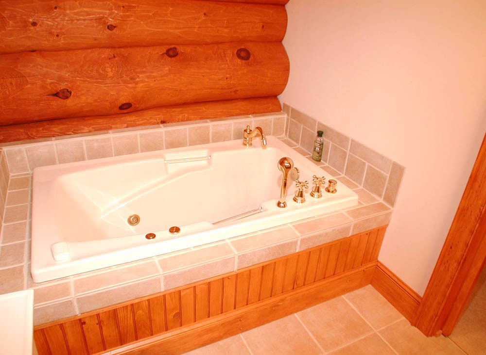 tile bath tub in a log home