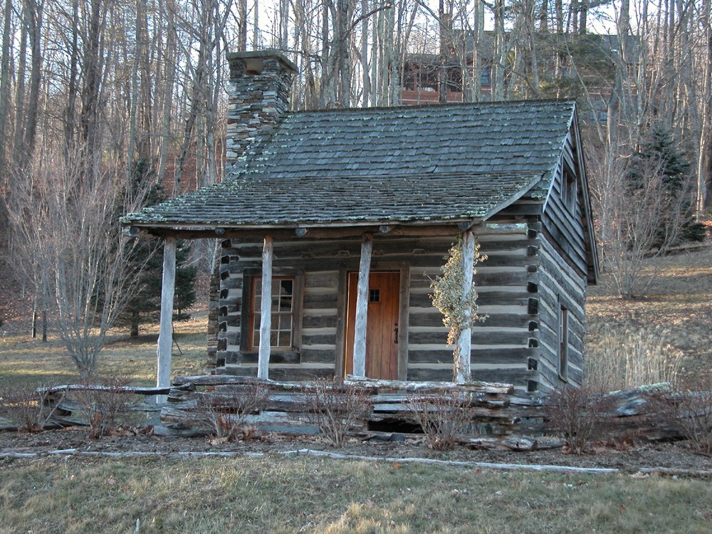 antique small log cabin house