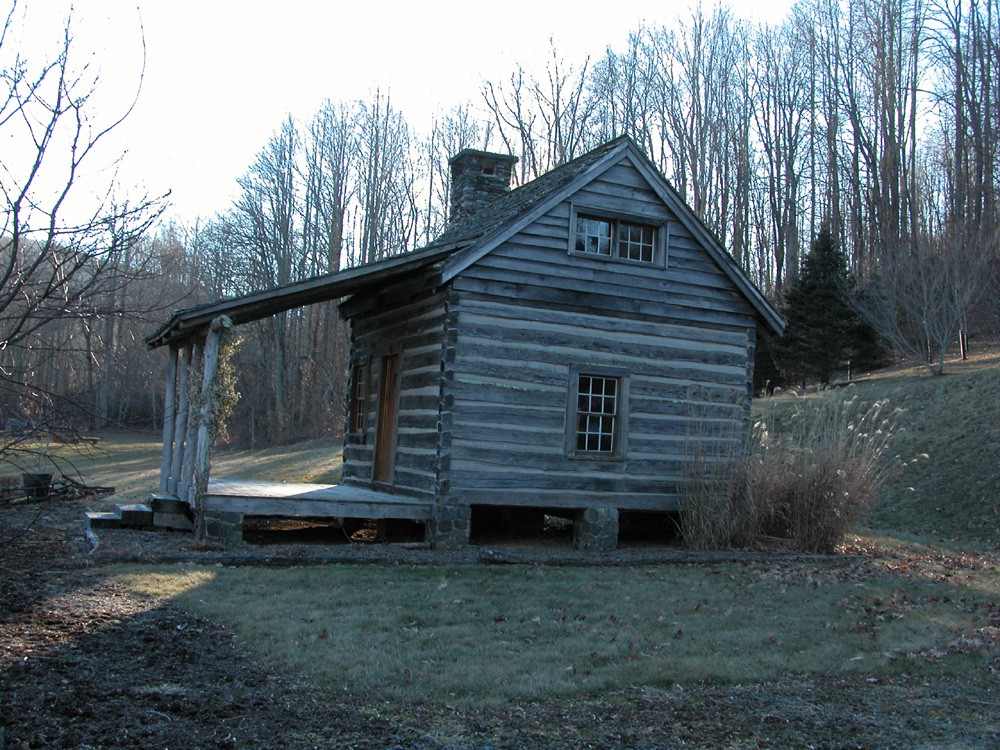 antique small log cabin house