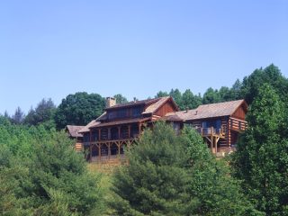 Log timber frame estate home