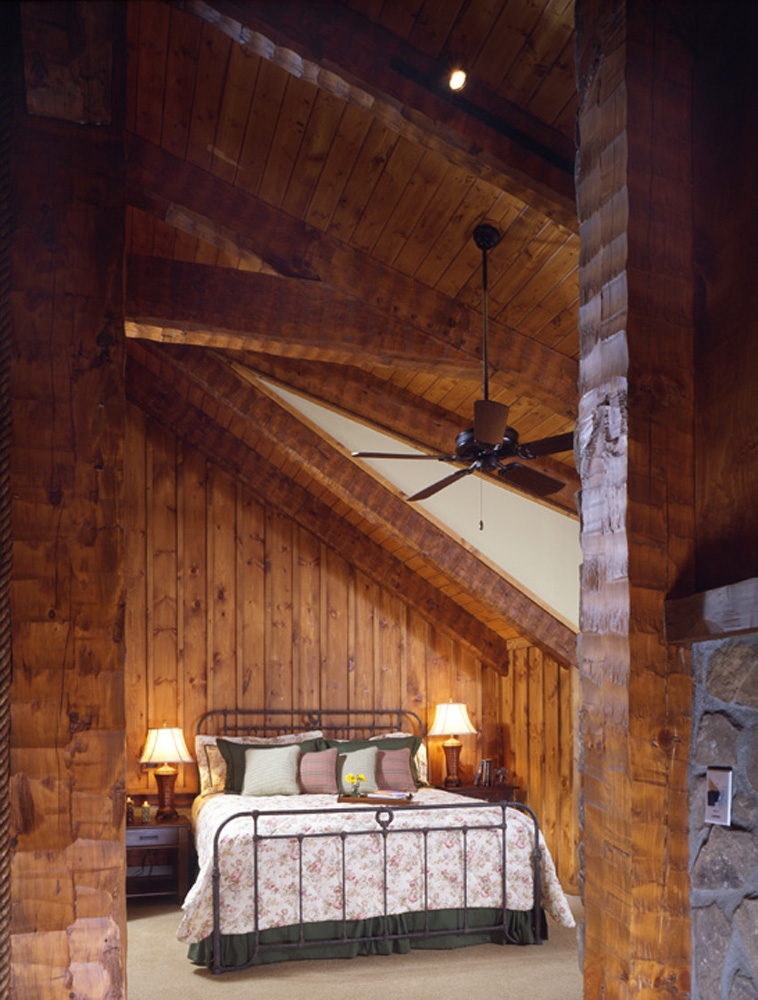 Bedroom in Timber Frame Log Hybrid Lodge Home