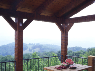 Outdoor space log timber frame hybrid lodge home, NC