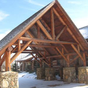 Round log portico at Luxury Estate Home in NC