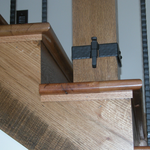 Stairs built with reclaimed wood and hand crafted iron bands