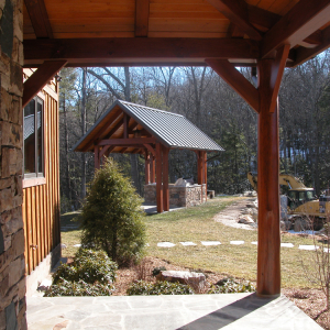 Timber Frame Hybrid estate home with outdoor kitchen