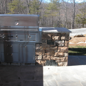 Outdoor Kitchen with stone accents